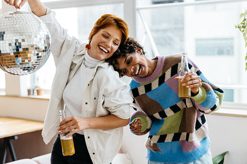 Creative colleagues enjoying a break in stylish co-working space