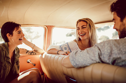 Friends having fun in a car