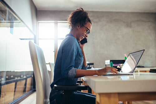 Businesswoman working at her office