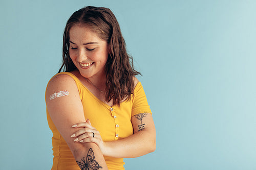 Woman after getting first vaccine dose