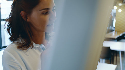 Businesspeople discussing in front of the whiteboard