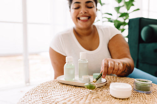 Woman taking care of her facial skin at home