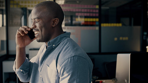 Businessman in conversation over a phone call