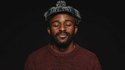 Close up of man wearing cap