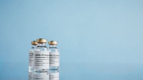 Three vials of covid-19 vaccine