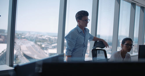 Business team working on computer together