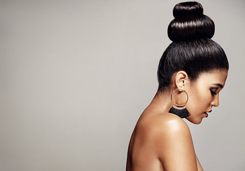 Woman with elegant hairstyle and makeup