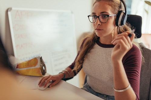 Female programmer working on new software development