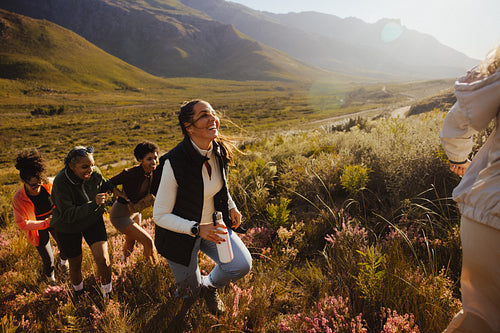 Friends hiking together in scenic nature