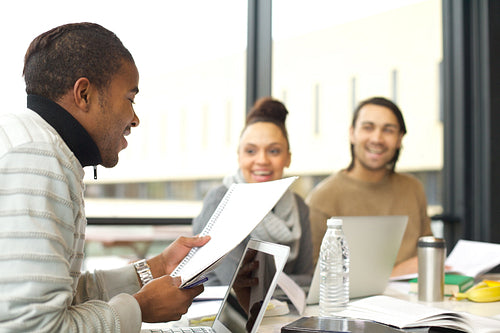 Afro american man studying hard for final exams