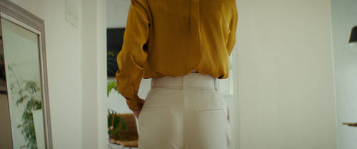 Business executive working from home office on laptop and phone