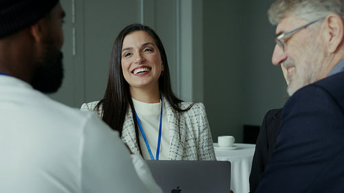 Happy business people in group discussion