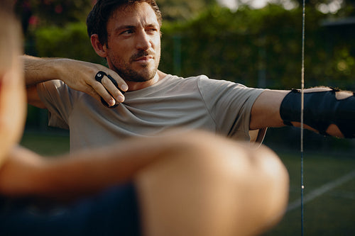 Man in archery training session