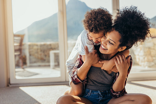 Mother and son playing at home