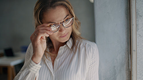 Cheerful businesswoman in her office