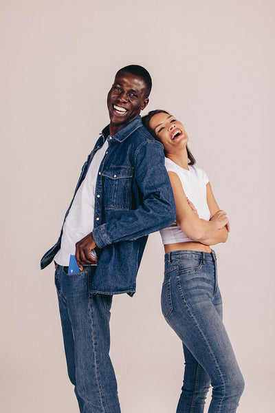 Student banking made easy. Two young adults embrace modern banking with a credit card