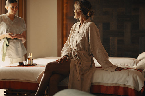 Woman receiving professional facial treatment at a spa for relaxation and wellness