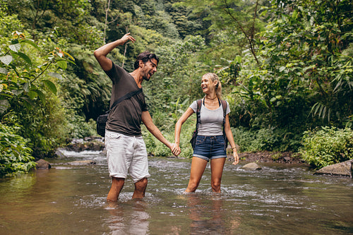 Couple having fun together outdoors on a hike