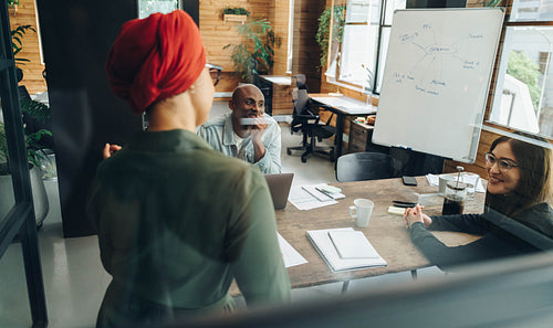Group of businesspeople having a meeting in a boardroom