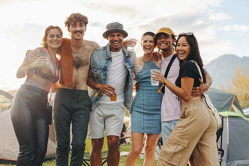 Happy young people having fun at a festival, celebrating and enjoying life