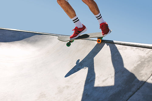 Skater in skate bowl