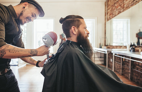 Hairdresser attending the client