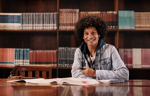 College student sitting in library
