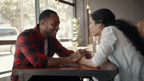 Loving couple sitting at a coffee shop