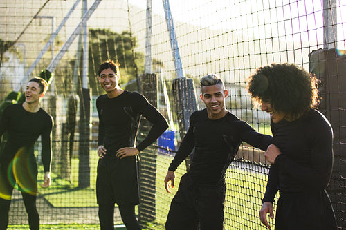 Football team having fun during practice