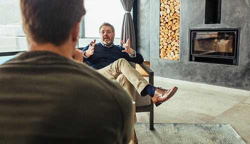 Psychologist counseling male patient