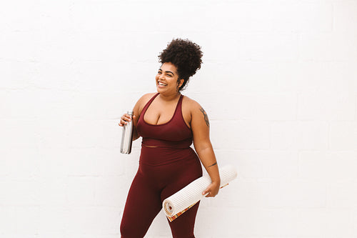 Smiling health woman after yoga workout