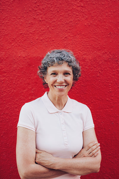 Confidently smiling mature woman