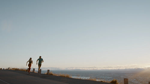 Two runners working out in the morning