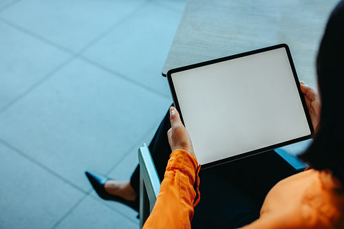 Corporate professional using a tablet with copy space for content