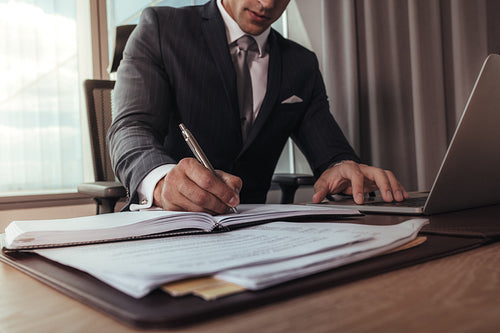 Businessman working at his office desk