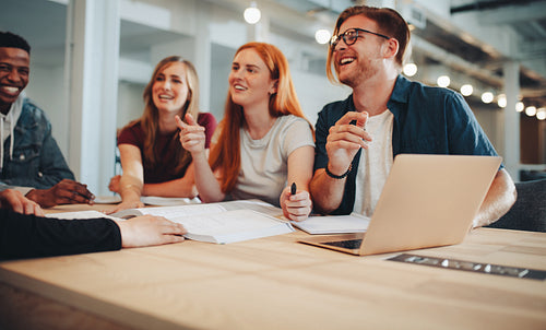 College students having group study