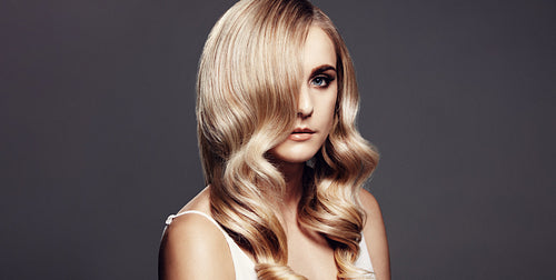 Elegant blonde with shiny hair and beautiful skin