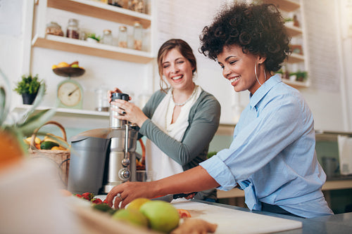 Bar employees preparing organic and fresh juices