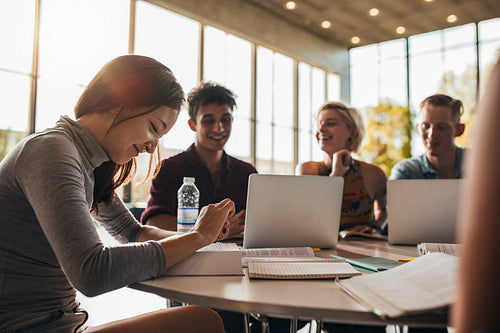 University students studying together in class