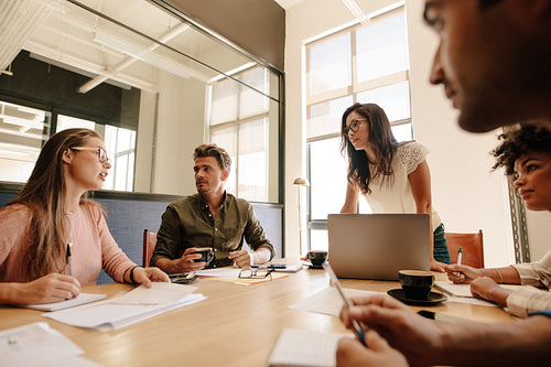 Business team discussing new strategy in meeting