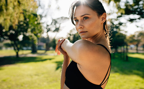 Woman warming up before a run 