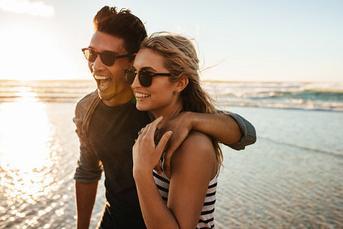 Beautiful young couple on beach vacation