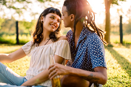 Couple in love sharing a romantic moment in a park