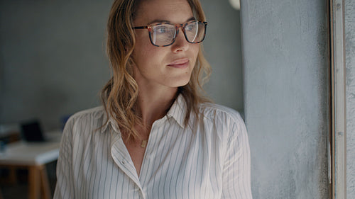 Positive businesswoman in office 