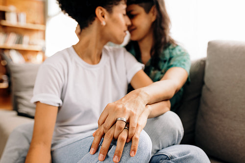 Wedded lesbian couple bonding at home