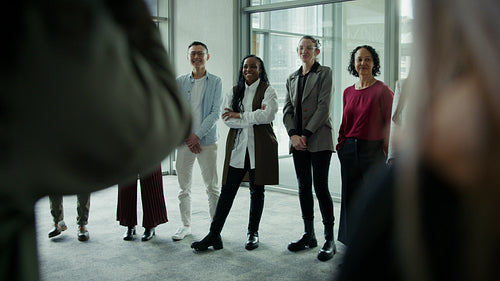 Joyful diverse business team laughing together