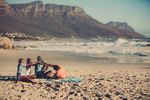 People on the beach having a party