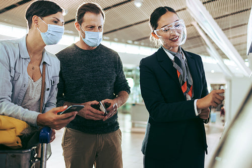 Passenger family taking help of airport staff