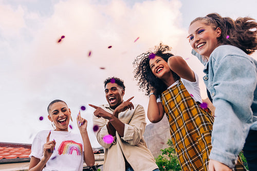 Group of young people dancing during a party