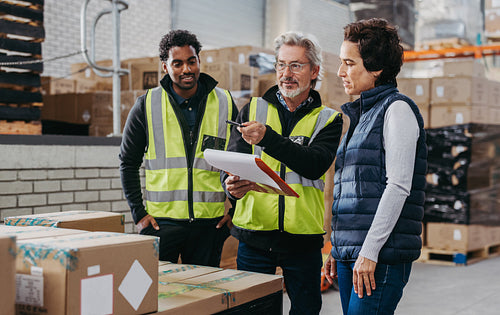 Warehouse team having a discussion during a meeting